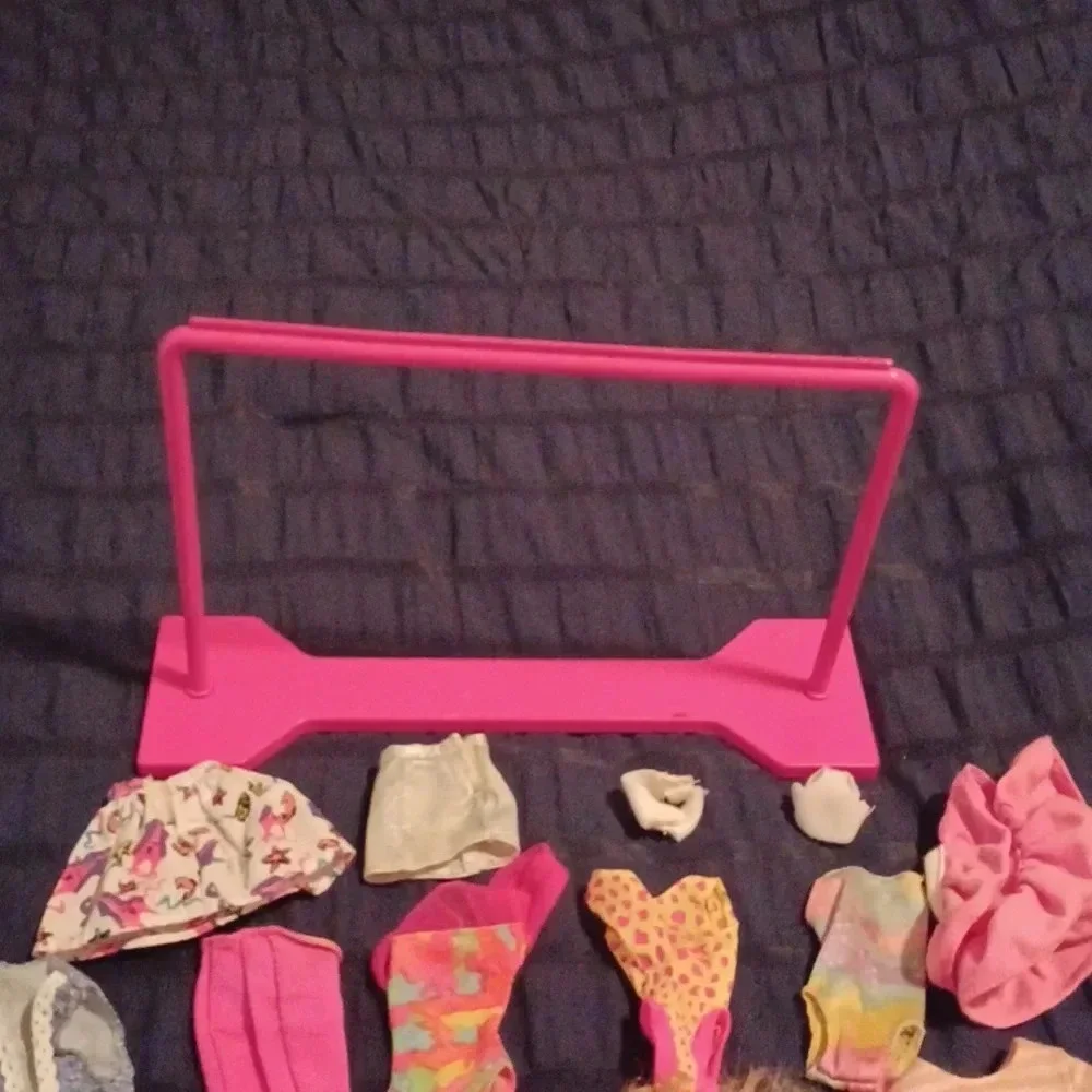 4 vintage Mattel Barbie dolls and one mini with extras